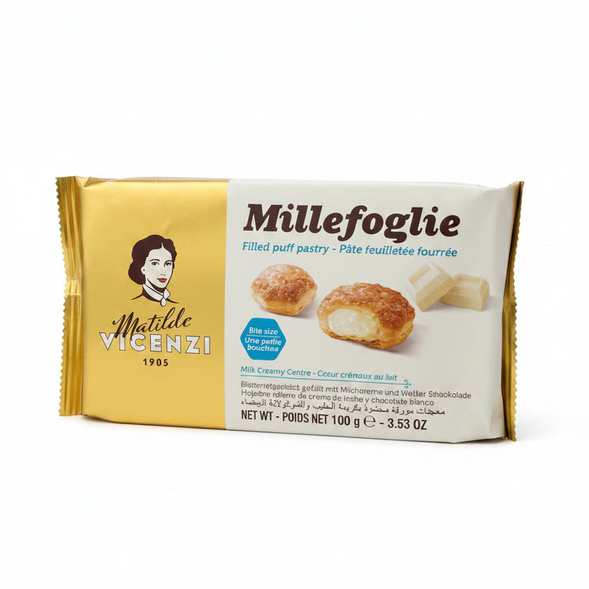 A package of Millefoglio pastry by Mille Vicenzi 1905, featuring a gold and white wrapper with an illustration of the brand's founder and photos of the filled puff pastry.